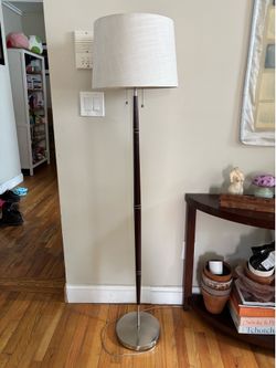 Set of two wooden floor lamps