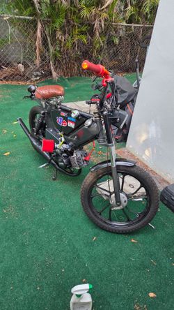 Tomos