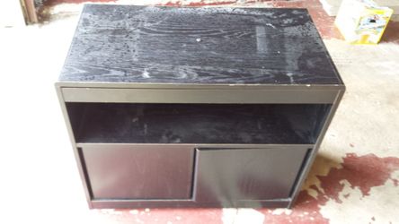 Black stained wood swivel TV stand on wheels