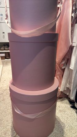 Three round pink organizing bin with lid