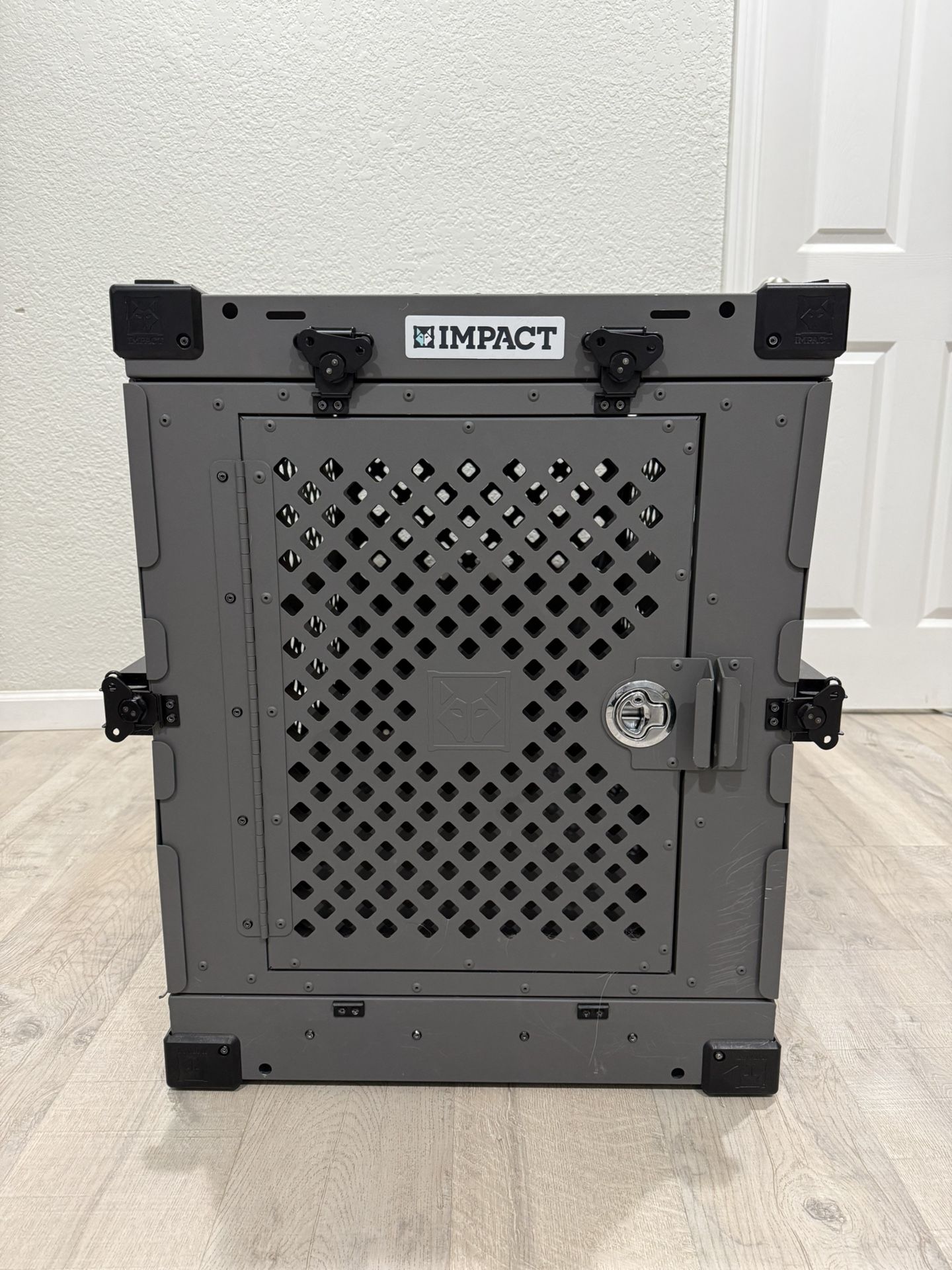 Collapsible dog crate by Impact