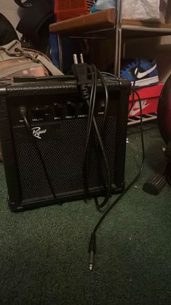 Rogue Electric Guitar With Amp And Case