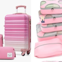New in Box Pink Sparkle 3 piece Luggage Set AND
Matching packing Cubes (purchased separately) with ladies travel kit.