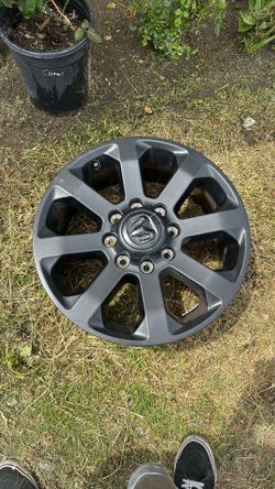 Full set of 20in rims mid night mode ram rims 8 lug