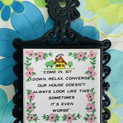 Vintage cast iron ceramic tile trivet/ wall hanger  