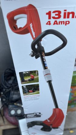 Homelite 13 in. 4 Amp Straight Electric String Trimmer.  