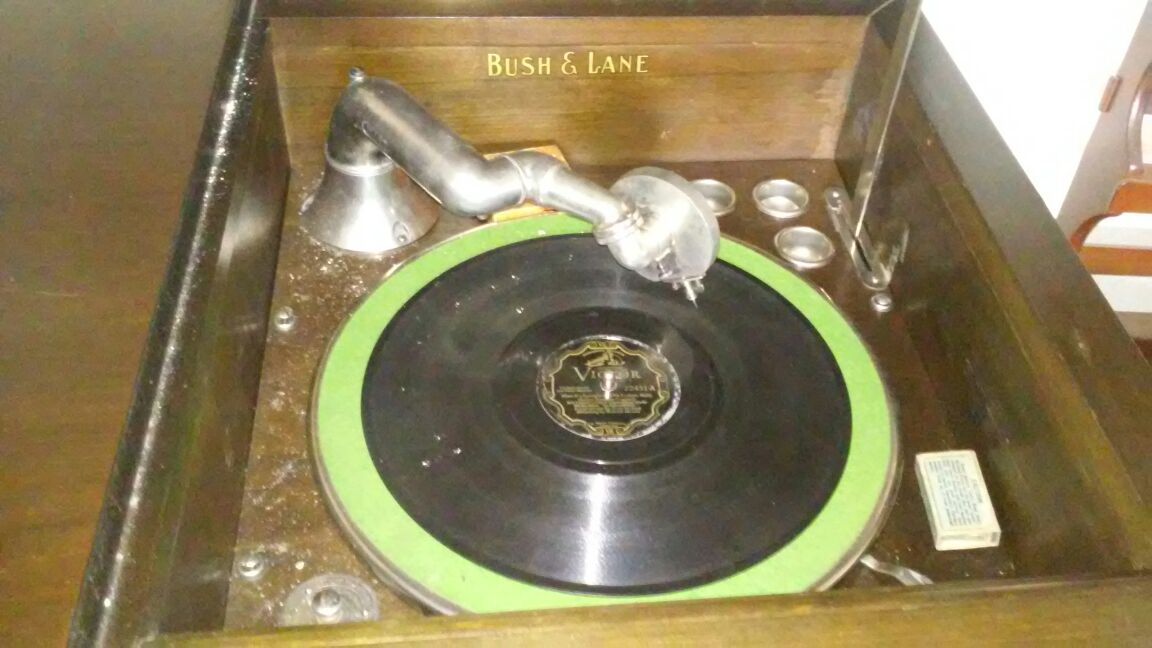 bush & lane vintage antique hand crank phonograph record player...over 100 records and extra needles