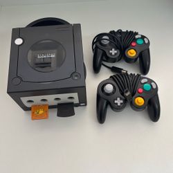 Nintendo Game Cube With Controllers And Super Mario Game