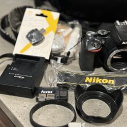 Nikon D3500 Bundle Nikon D3500 DSLR Bundle – 35mm Portrait Lens + Extras – $300