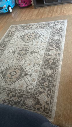 Brown long dining room rug