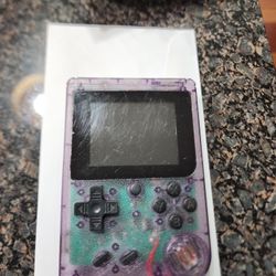 Retro Game System. Similar to Game boy. Has 200 games on it. (D20)