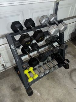 Dumbbell weight set with dumbbell rack, spin bike and rowing machine