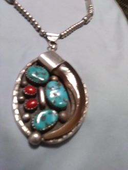Navajo turquoise, coral, Bear claw and sterling silver necklace
