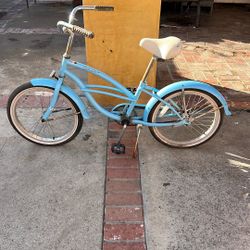This is a Firmstrong 20" Urban Girl's Single Speed Beach Cruiser Bicycle in Baby Blu