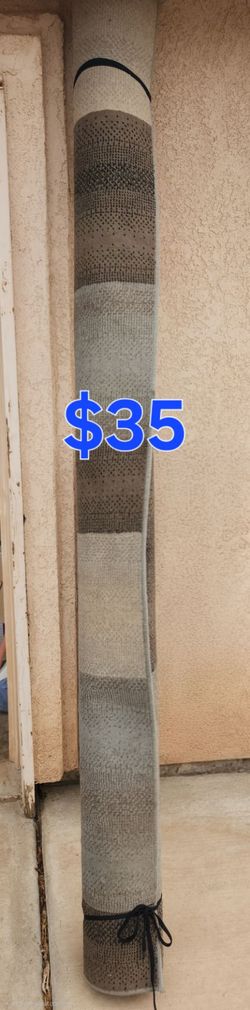 Rolled Area Rug with Striped Pattern