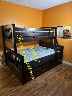 Bunk Bed.  full - twin  mattress included.     New in a box
