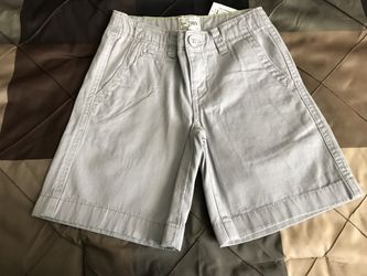 Children place boys shorts