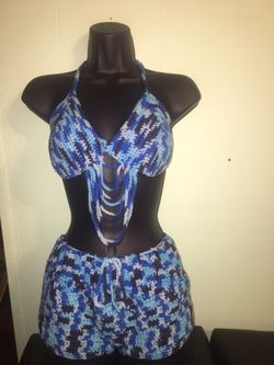 Crochet bikini top and shorts set .