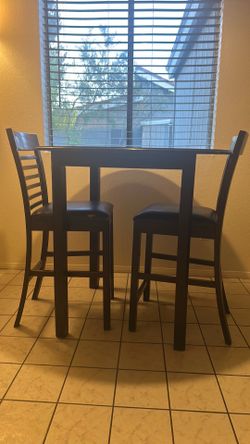 Round counter height dining table couple chairs