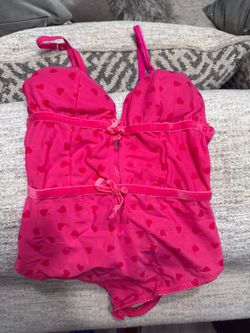 Pink Bodysuit with Front Slit and Bow Details – Good Condition 