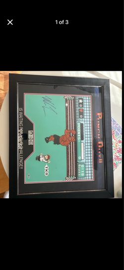 Mike Tyson autographed punch out poster (framed)