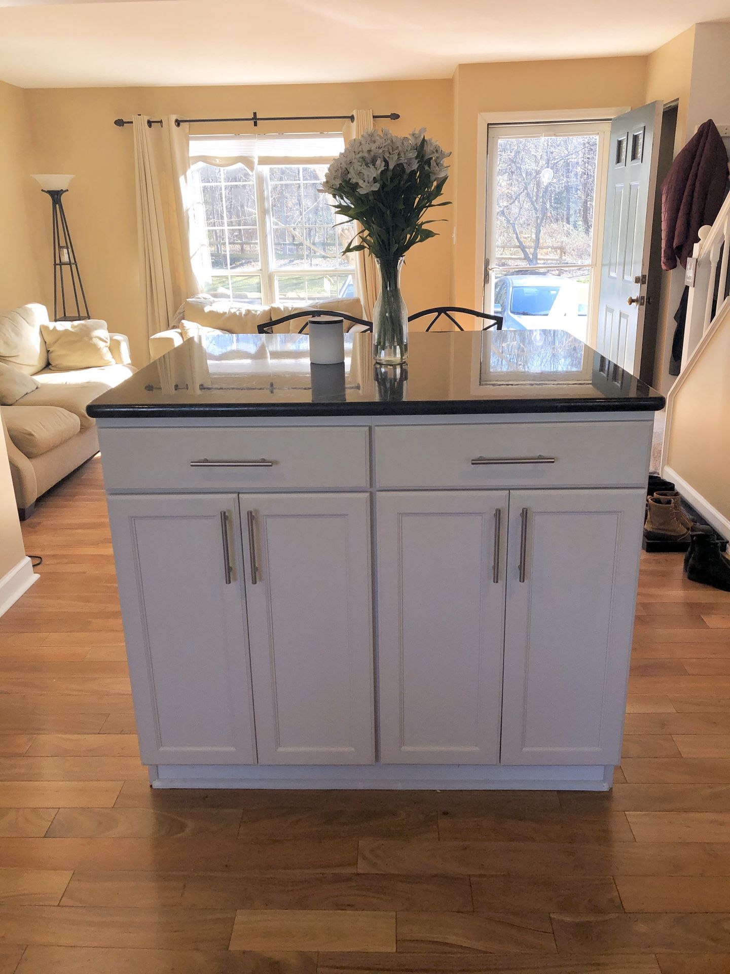 Large White Kitchen Island with Bar and Cabinets