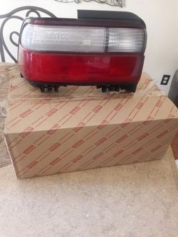95-97 Toyota Corolla tail light LH Brad New