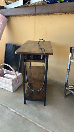 Side table with phone outlet