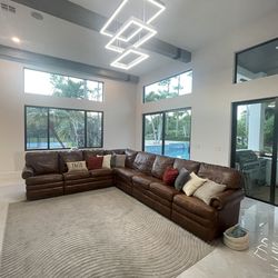 Leather 8 seater “L” shape sectional sofa couch with 2 recliners