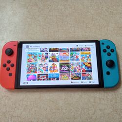 NINTENDO SWITCH OLED with 100 GAMES MARIO WONDER,MARIO PARTY,KIRBY,POKEMON,ZELDA and More