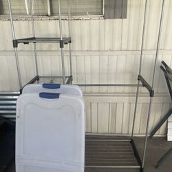 1 clothes rack 2 Plastic Containers 