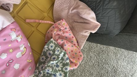 3 toddler girl/baby girl summer hats, cart cover, and 2 towels