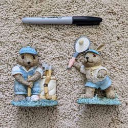 Pair of Mervyn's bunny rabbit hare golf and tennis sports figurines sculptures circa 1993