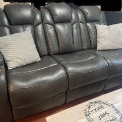Power Reclining Sofa.  1,200