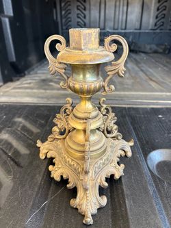 Vintage or brass candlestick holder, rococo or barque.