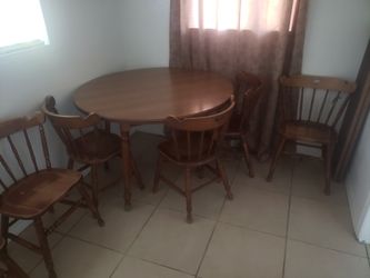 Wooden table with chairs