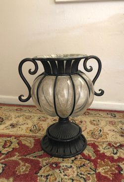 Iron and glass vase