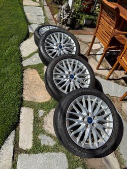 17" OEM Ford Wheels w/ Pirelli Tires (5x108)