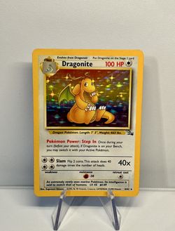 dragonite pokemon card fossil 1st Edition Holo 4/62 PSA 9 TBC Games proof acrylic case and featuring a striking image of the captivating character 1999 Pokemon Dragonite 4/62 Fossil
