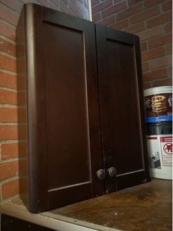Small brown wall cabinet