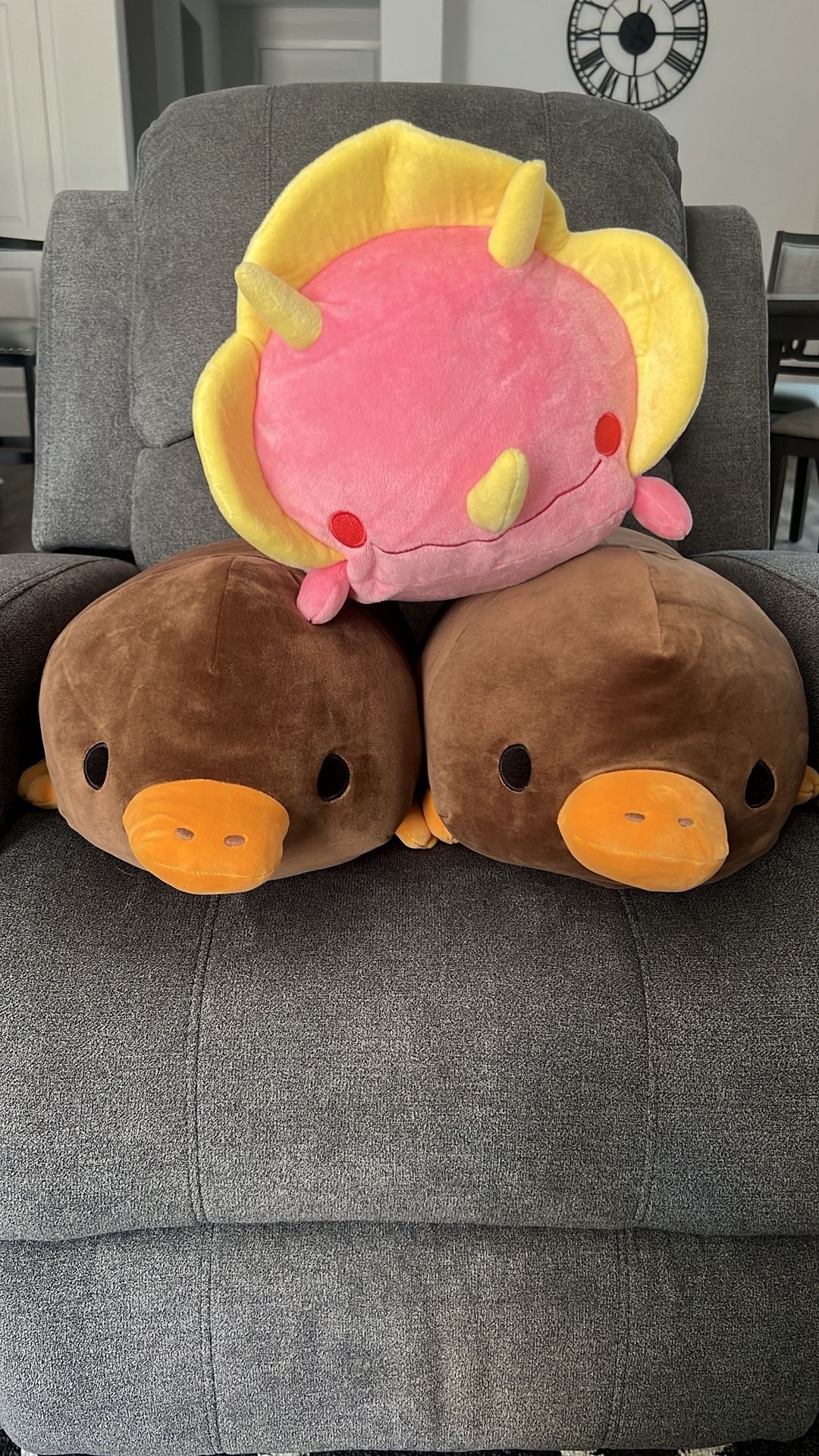 Pink Triceratops and Brown Platypus Exclusive Plushies