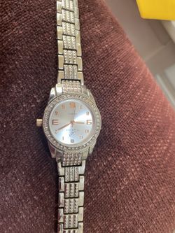 Women’s Burgie dress watch silver tone round face with CZ’s bracelet band quartz movement