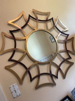 Gold/brown metal mirror- Aprox 24”