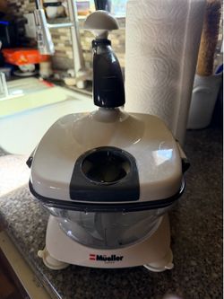 Manual food chopper by Mueller Austria.