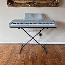 Casio  WK-210 45 Keyboard And Stand