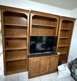 Free 4 piece entertainment center. Without the T.V.