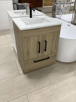 24” vanity, stone top, available for pick up