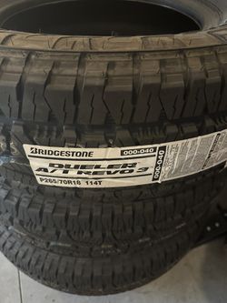 Bridgestone AT tires - NEW - P265/70R18