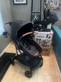 New baby trend six and one modular travel system - midnight Cocoa