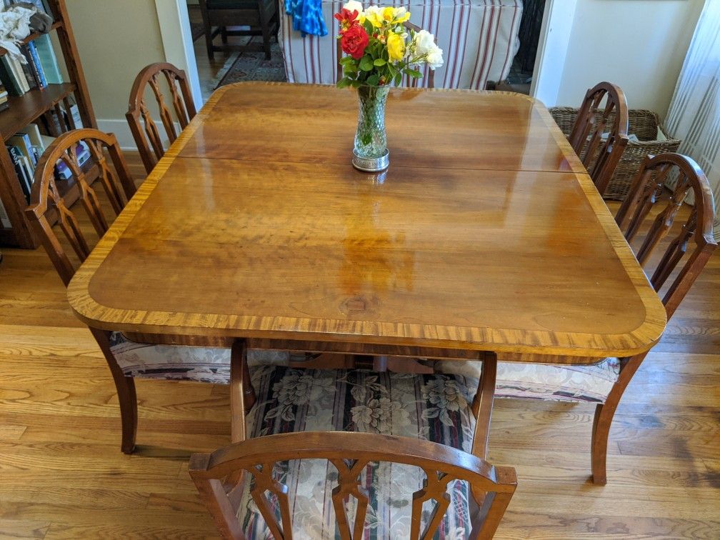 Vintage Duncan Phyfe reproduction Cherry Wood table and 7 chairs